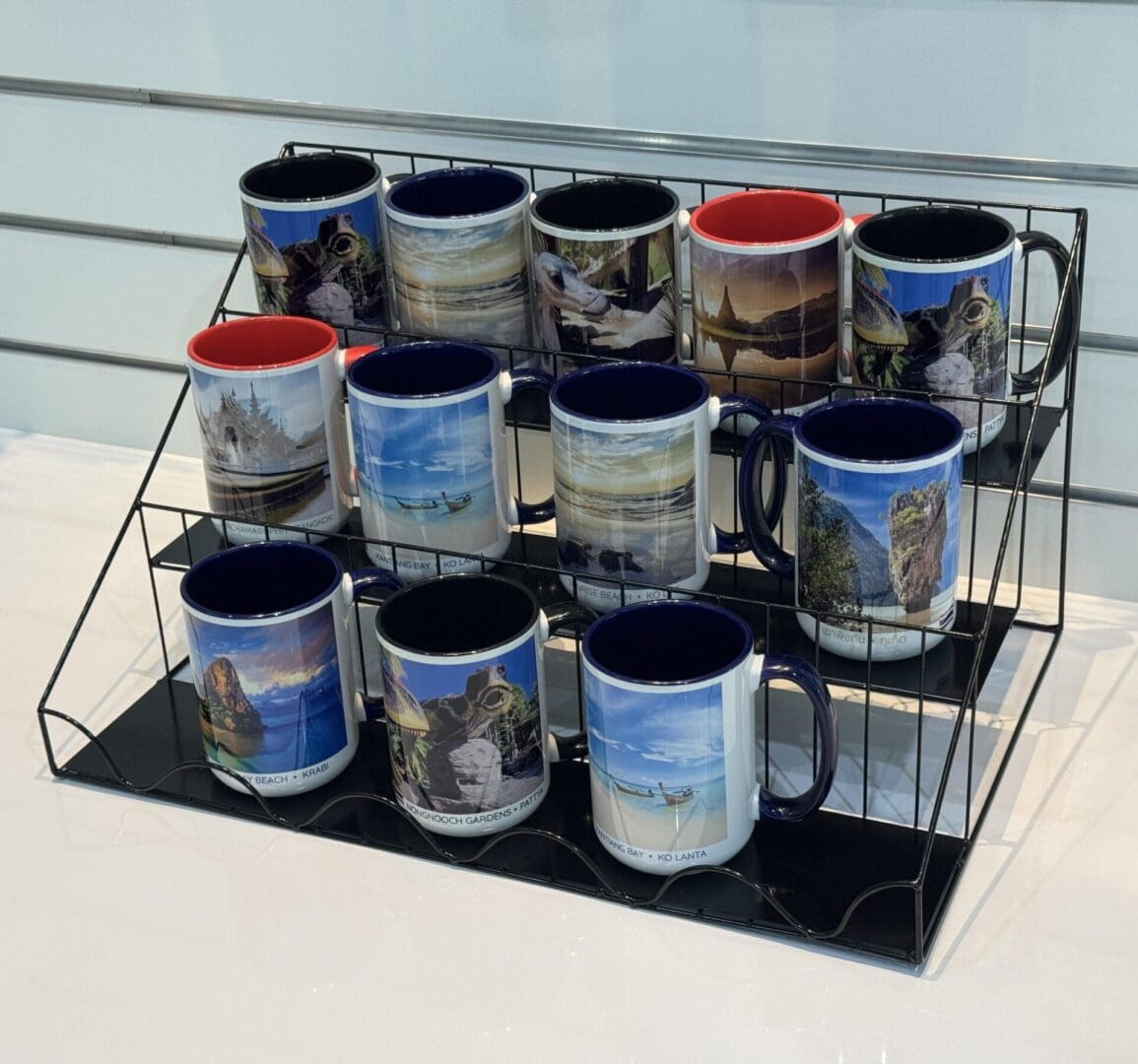 Thai landscape mugs on display.