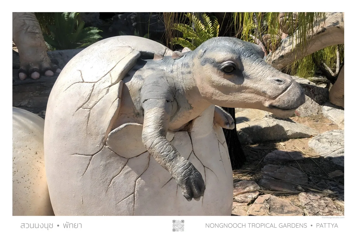 Baby dinosaur hatching from egg.