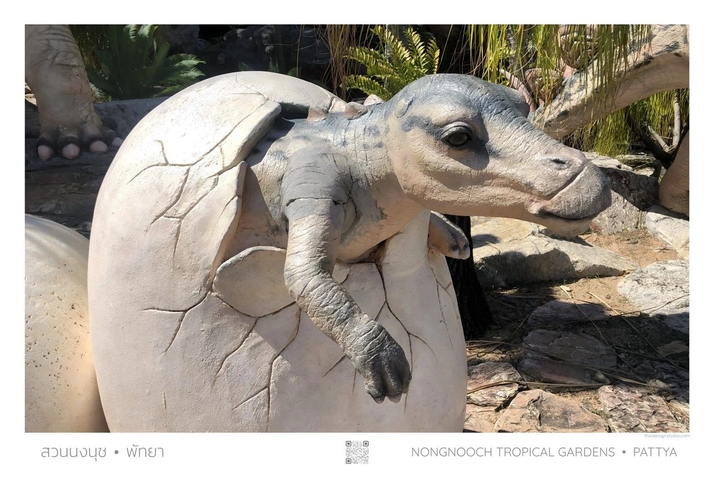 Baby dinosaur hatching from egg.